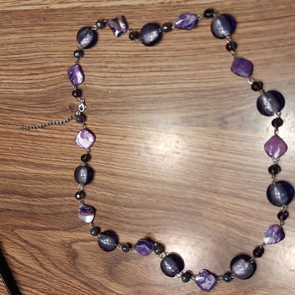 Necklace light purple and dark purple stones.